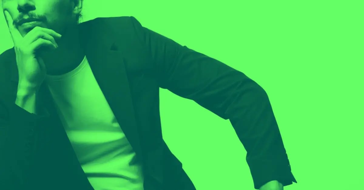 man-sitting-and-thinking-green-mask-1200x627