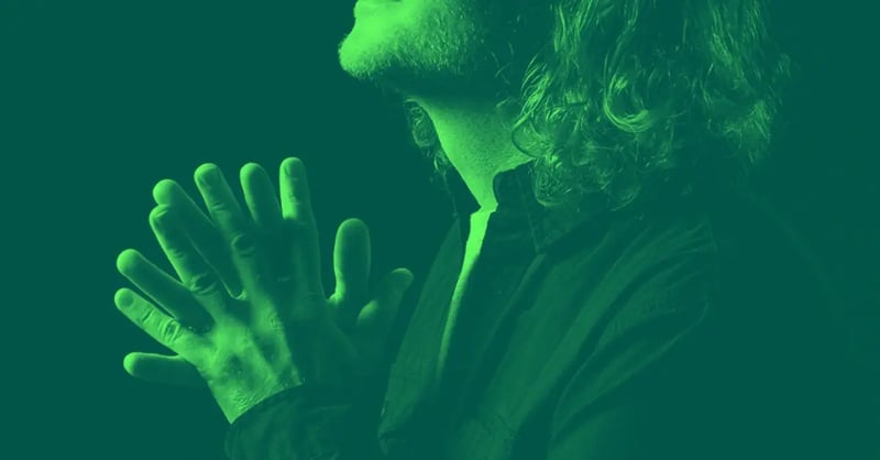 A man thinking about the hybrid work paradox