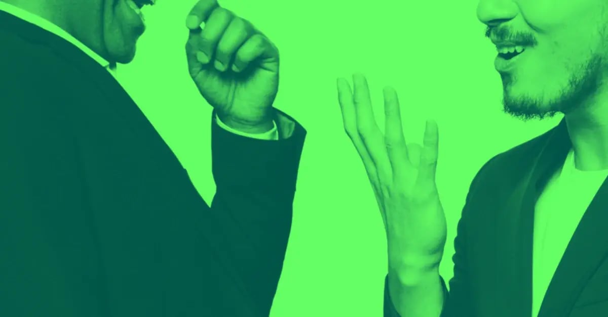 Two men discussing feedback