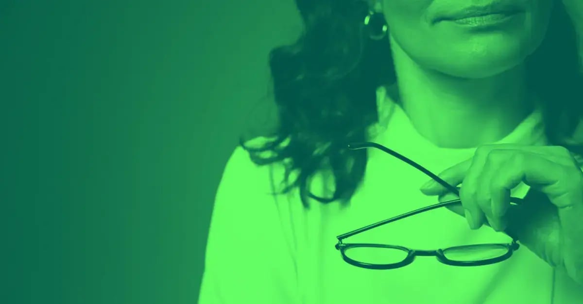 woman-holding-glasses-green-1200x627