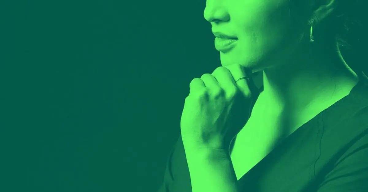 A woman thinking about technology and bias