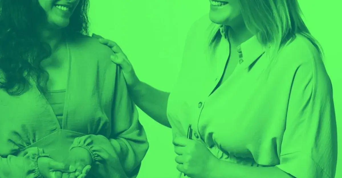 two-women-smiling-green-mask-1200x627