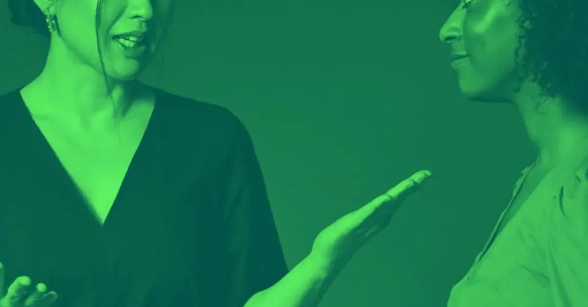 Two women busting coaching myths