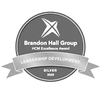 Brandon hall 2025 silver awards badge for leadership development in greyscale