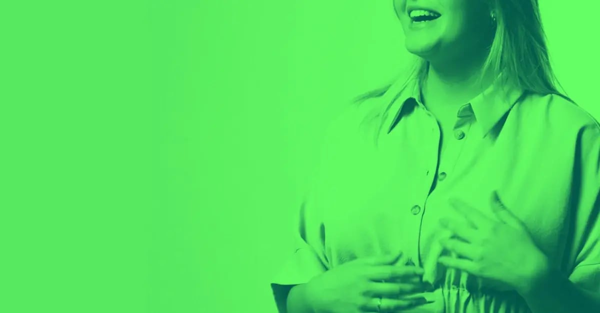 woman-talking-with-hands-green-mask-1200x627